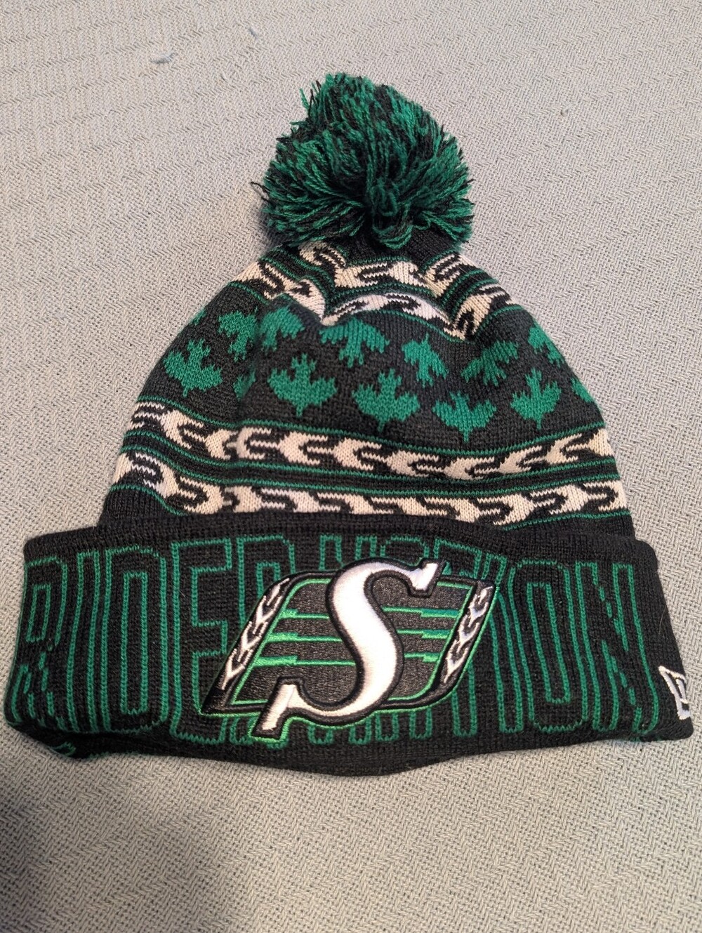 Saskatchewan Roughriders CFL New Era Winter Cuffed Knit Pom Hat Cap OSFA